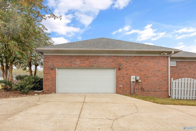 view of property exterior featuring a garage