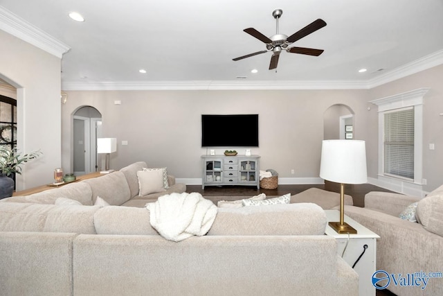 3011 Chimney Cove Cir, Brownsboro, AL 35741 - living room featuring arched walkways, ceiling fan, recessed lighting, crown molding, and baseboards