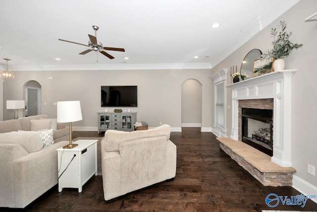 3011 Chimney Cove Cir, Brownsboro, AL 35741 - living area featuring arched walkways, ceiling fan, a fireplace, recessed lighting, and baseboards