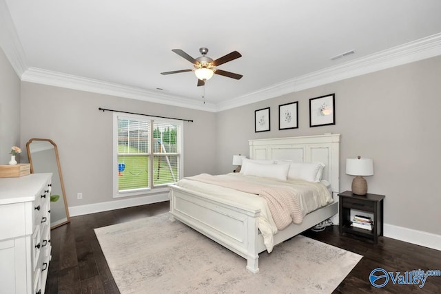 3011 Chimney Cove Cir, Brownsboro, AL 35741 - bedroom featuring ornamental molding, baseboards, dark wood finished floors, and a ceiling fan