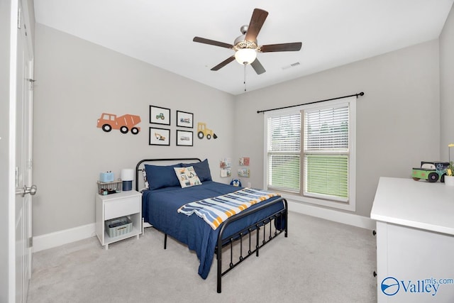 3011 Chimney Cove Cir, Brownsboro, AL 35741 - bedroom with light carpet, baseboards, and ceiling fan