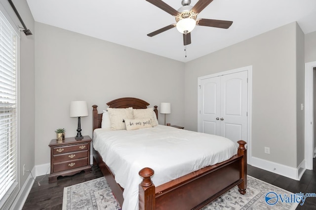 3011 Chimney Cove Cir, Brownsboro, AL 35741 - bedroom featuring baseboards, a closet, wood finished floors, and a ceiling fan