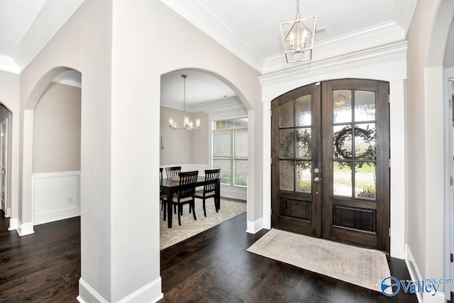 3011 Chimney Cove Cir, Brownsboro, AL 35741 - entryway featuring a chandelier, french doors, arched walkways, dark wood-style flooring, and ornamental molding