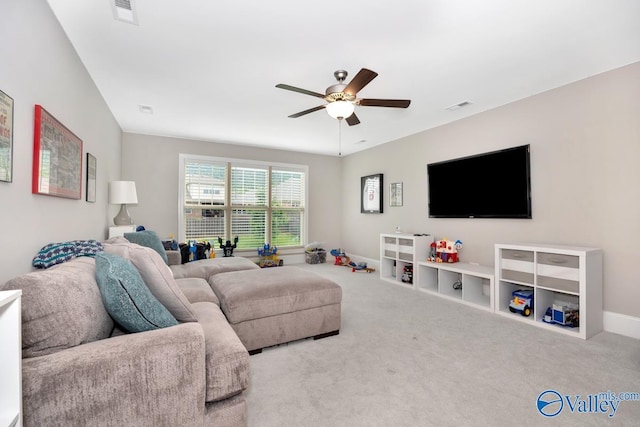 3011 Chimney Cove Cir, Brownsboro, AL 35741 - living area featuring a ceiling fan, carpet flooring, and baseboards