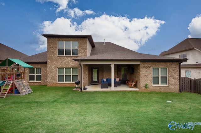 3011 Chimney Cove Cir, Brownsboro, AL 35741 - back of property featuring brick siding, a playground, a patio area, and an outdoor living space