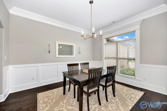 3011 Chimney Cove Cir, Brownsboro, AL 35741 - dining area featuring crown molding, a chandelier, wainscoting, and wood finished floors