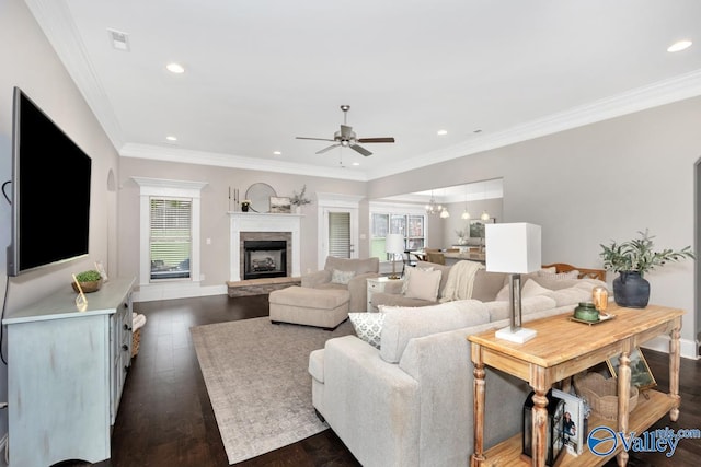 3011 Chimney Cove Cir, Brownsboro, AL 35741 - living area with a ceiling fan, healthy amount of natural light, a stone fireplace, recessed lighting, and dark wood-style flooring