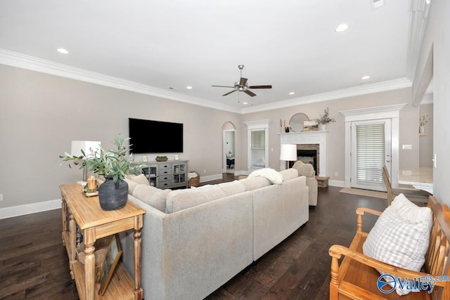 3011 Chimney Cove Cir, Brownsboro, AL 35741 - living area with ceiling fan, baseboards, recessed lighting, ornamental molding, and arched walkways