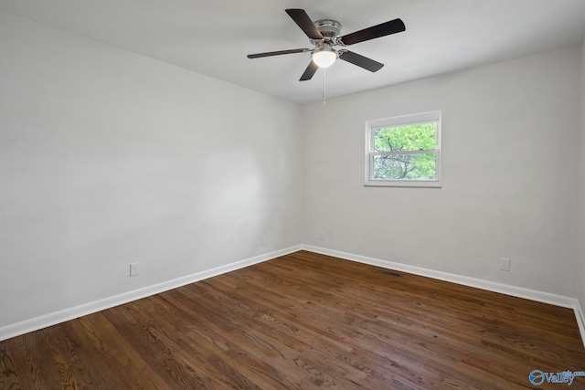 2707 Morgan St SW, Huntsville, AL 35805 - unfurnished room with baseboards, visible vents, ceiling fan, and dark wood-type flooring