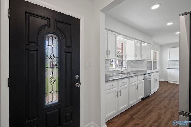 2707 Morgan St SW, Huntsville, AL 35805 - foyer entrance featuring dark wood-style floors, recessed lighting, and baseboards