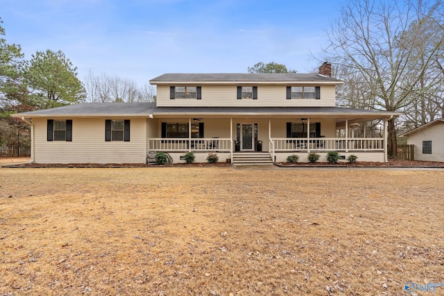 farmhouse inspired home with covered porch