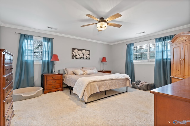 bedroom featuring carpet flooring, ceiling fan, and ornamental molding