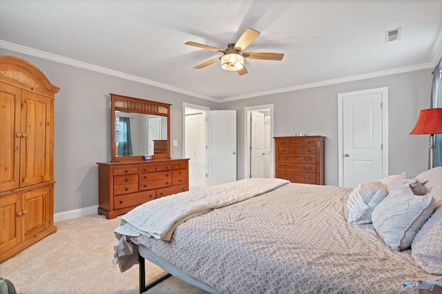 bedroom with light carpet, ceiling fan, and crown molding