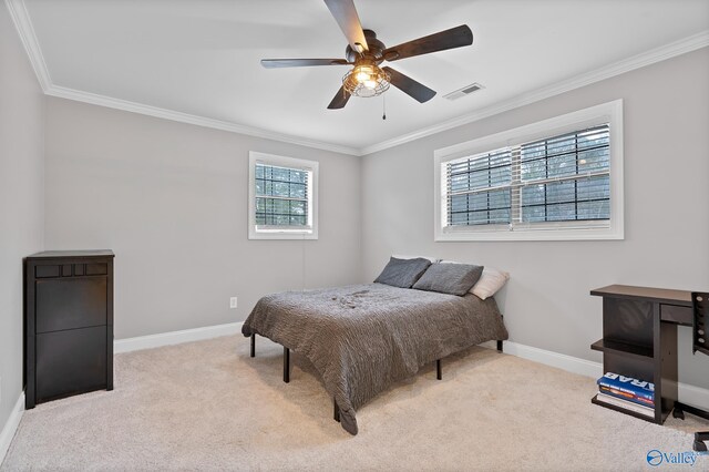 bedroom with light carpet, ceiling fan, and ornamental molding