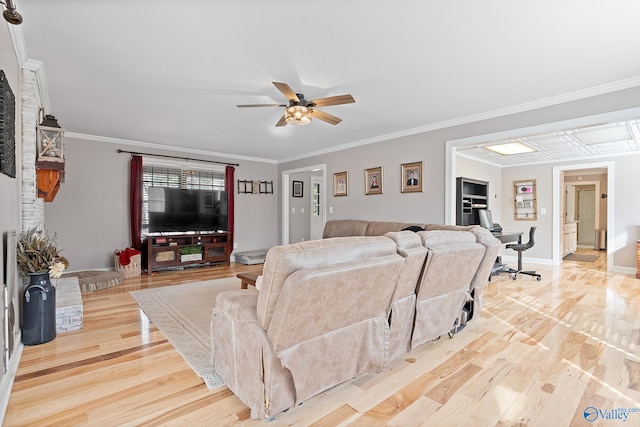 living room featuring light hardwood / wood-style floors, ceiling fan, and ornamental molding