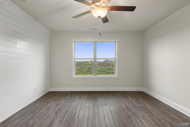 228 Cherry Laurel Dr, Hazel Green, AL 35750 - spare room with wood finished floors, wood walls, and a ceiling fan