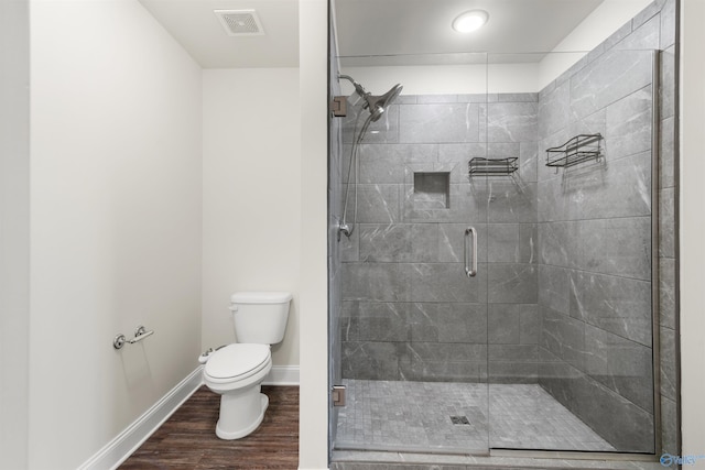 228 Cherry Laurel Dr, Hazel Green, AL 35750 - full bathroom featuring wood finished floors and a shower stall
