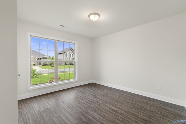 228 Cherry Laurel Dr, Hazel Green, AL 35750 - spare room featuring dark wood-type flooring and baseboards
