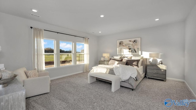 bedroom featuring light colored carpet