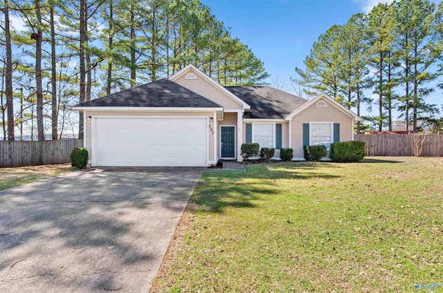 ranch-style home featuring driveway, fence, roof with shingles, a front yard, and a garage