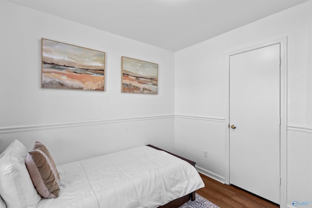 bedroom featuring wood finished floors