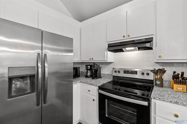 kitchen with white cabinets, backsplash, under cabinet range hood, and stainless steel appliances