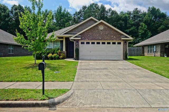 view of front of property with brick siding, an attached garage, fence, driveway, and a front lawn