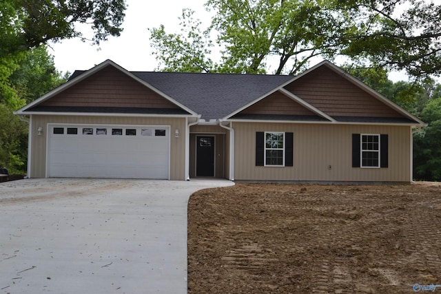 993 Old Cullman Rd, Arab, AL 35016 - view of front of home featuring concrete driveway and a garage