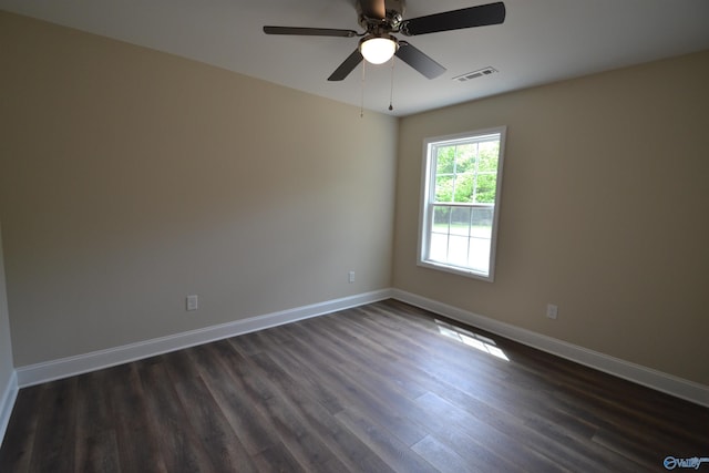 993 Old Cullman Rd, Arab, AL 35016 - unfurnished room featuring dark wood-style flooring, baseboards, and a ceiling fan