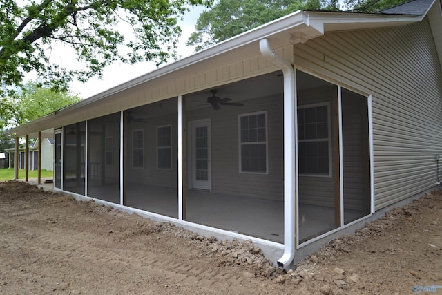 993 Old Cullman Rd, Arab, AL 35016 - view of side of home featuring a sunroom and ceiling fan