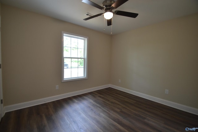 993 Old Cullman Rd, Arab, AL 35016 - spare room with dark wood finished floors, a ceiling fan, and baseboards