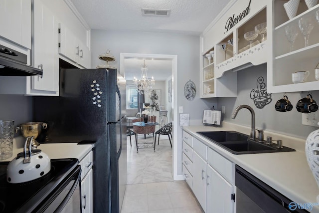 kitchen with light countertops, visible vents, white cabinetry, a sink, and dishwasher