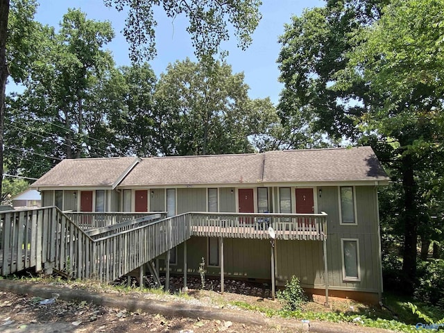 view of front of house featuring a wooden deck