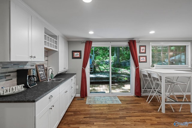 228 George Byrd Dr, Owens Cross Roads, AL 35763 - kitchen with a sink, open shelves, crown molding, white cabinetry, and tasteful backsplash