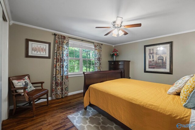 228 George Byrd Dr, Owens Cross Roads, AL 35763 - bedroom featuring dark wood-type flooring, ornamental molding, baseboards, and a ceiling fan