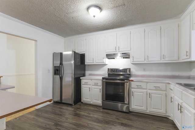 kitchen featuring stainless steel appliances, dark hardwood / wood-style floors, white cabinets, and a textured ceiling