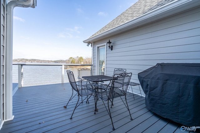 415 County Road 389, Centre, AL 35960 - wooden deck with outdoor dining space and a grill