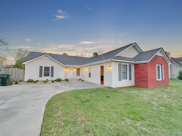 107 Patra Dr, Madison, AL 35758 - ranch-style house with a shingled roof, concrete driveway, and brick siding