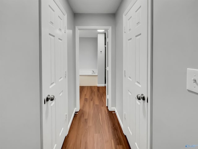 107 Patra Dr, Madison, AL 35758 - corridor featuring wood finished floors and baseboards