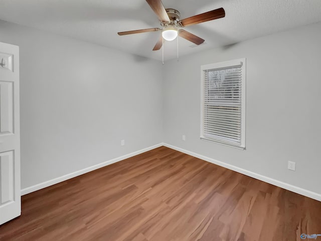 107 Patra Dr, Madison, AL 35758 - unfurnished room featuring ceiling fan and wood finished floors