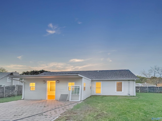 107 Patra Dr, Madison, AL 35758 - rear view of house featuring a fenced backyard, a patio, and a gate