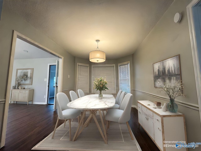 107 Patra Dr, Madison, AL 35758 - dining area with dark wood finished floors and baseboards