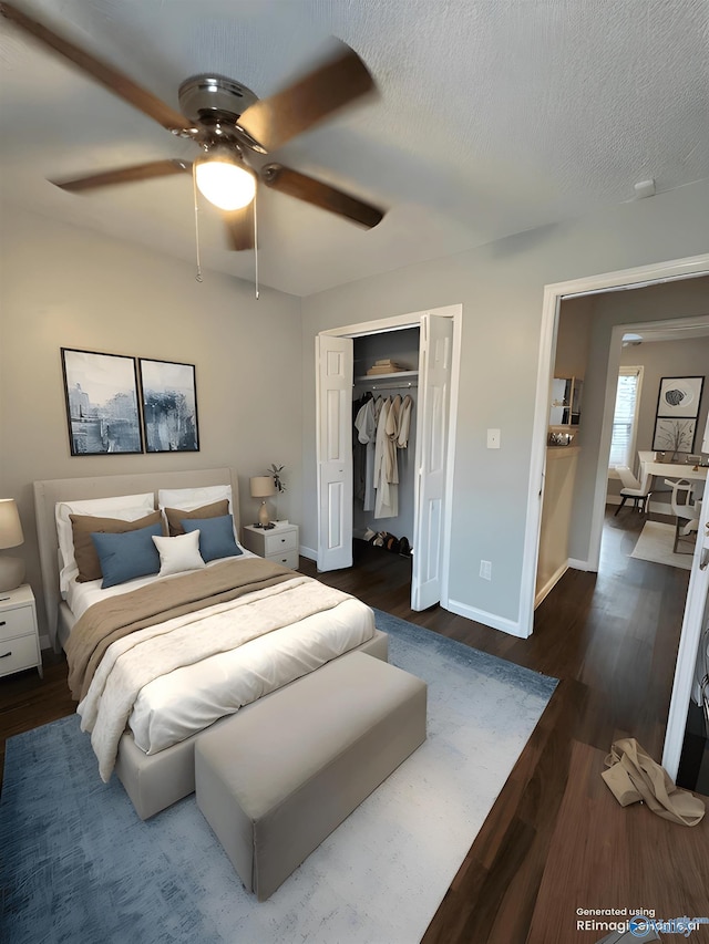 107 Patra Dr, Madison, AL 35758 - bedroom with dark wood-style flooring, a closet, a ceiling fan, and a textured ceiling
