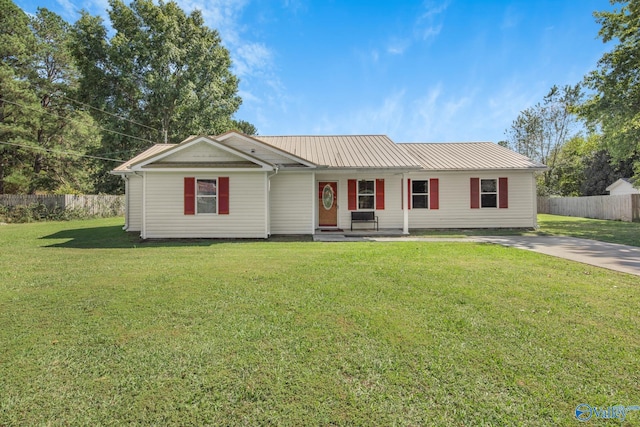 ranch-style house with a front lawn