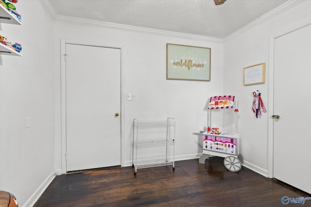 interior space with crown molding, dark hardwood / wood-style flooring, and a textured ceiling