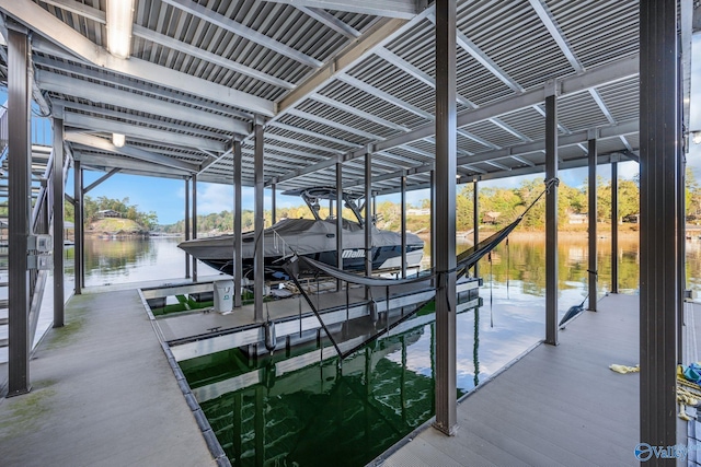 dock area featuring a water view