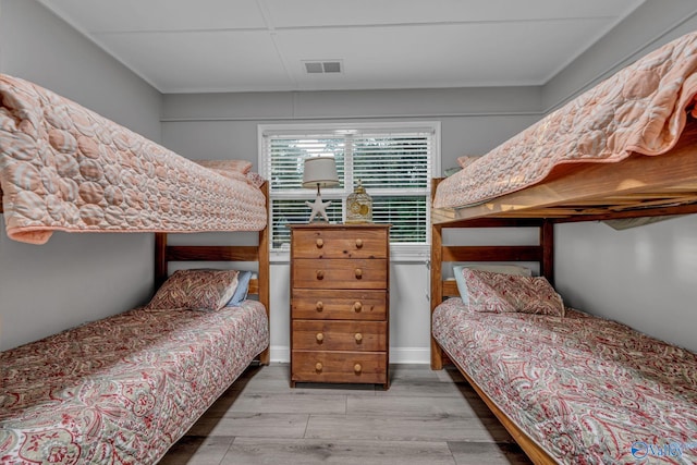 bedroom with light hardwood / wood-style floors