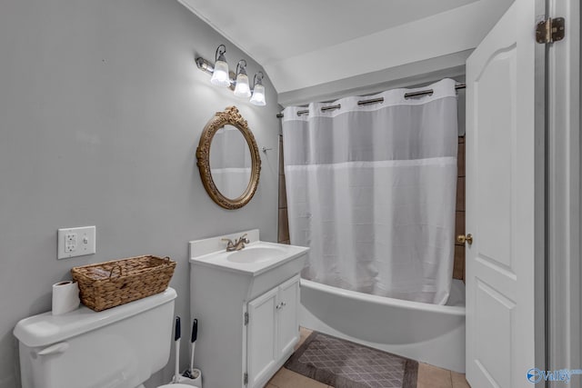 full bathroom featuring vanity, tile patterned flooring, toilet, lofted ceiling, and shower / bathtub combination with curtain