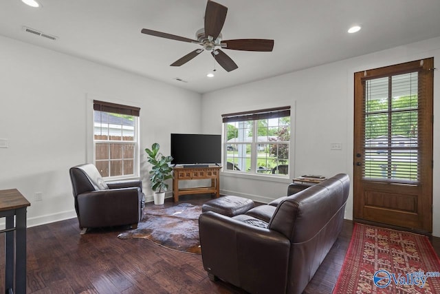 living room with wood finished floors, recessed lighting, ceiling fan, and baseboards