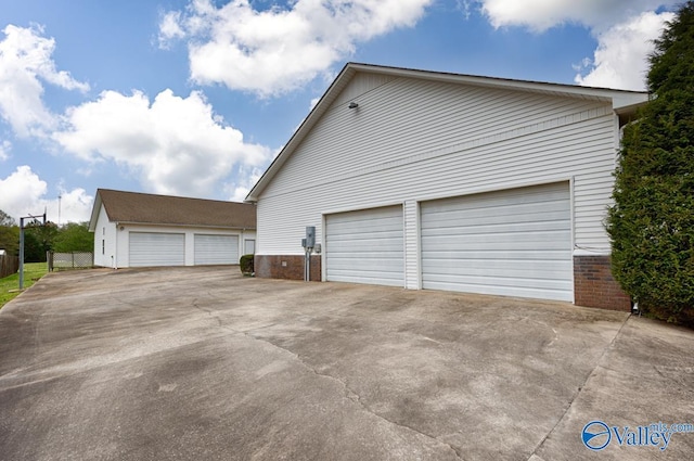 detached garage with fence